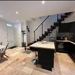 Maison De